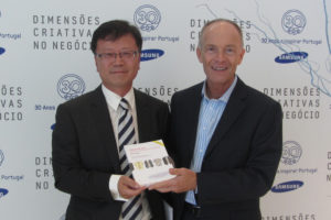 creative industries keynote speaker David Parrish with Sam Lee, President of Samsung Portugal, after keynote speech on creativity in business in creative city Lisbon.