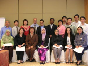 Training workshop participants in Singapore with David at his interactive workshop on business development